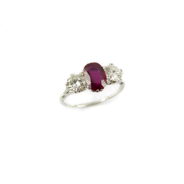 Ruby and diamond three stone ring, the oval facetted Burma ruby 1.78ct,